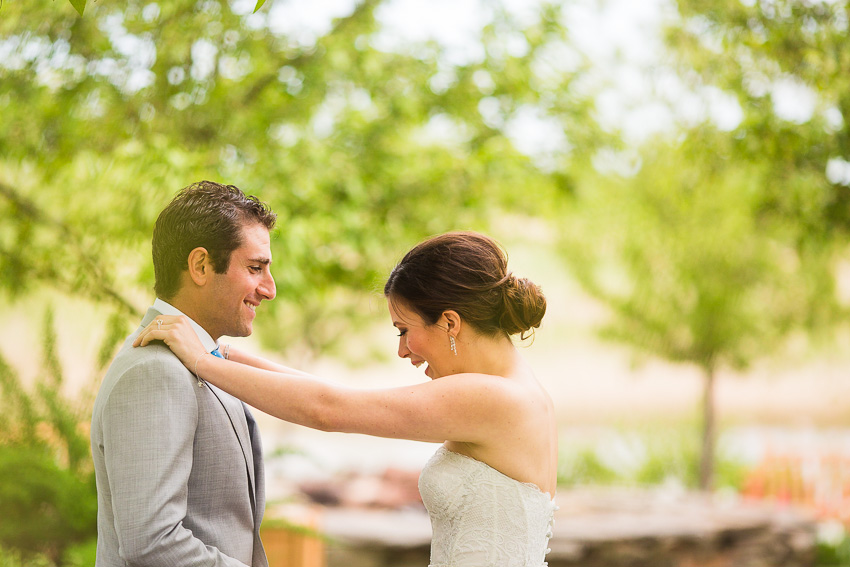 candid moments before wedding at Turning Stone's Great Lawn