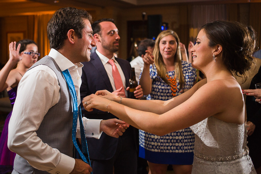 candid wedding reception moment at Turning Stone