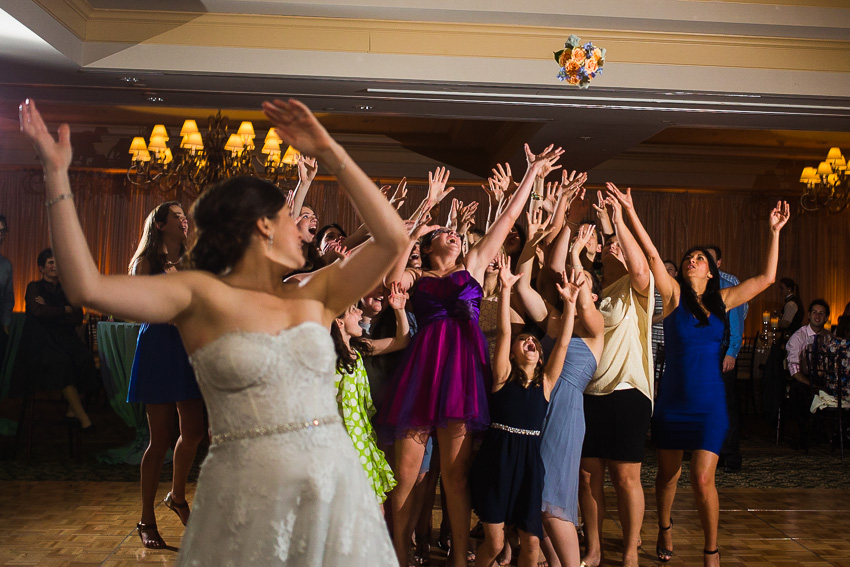 bouquet toss at Turning Stone reception
