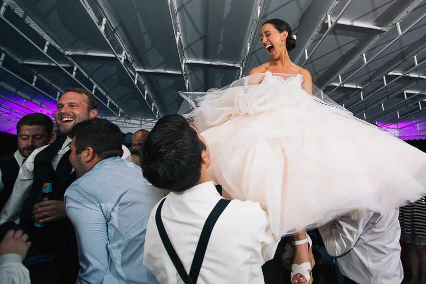 bride's reaction during Hora at Aurora Inn