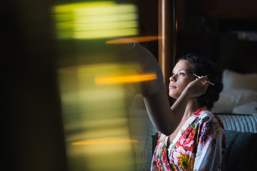 bride getting ready at white springs manor in geneva