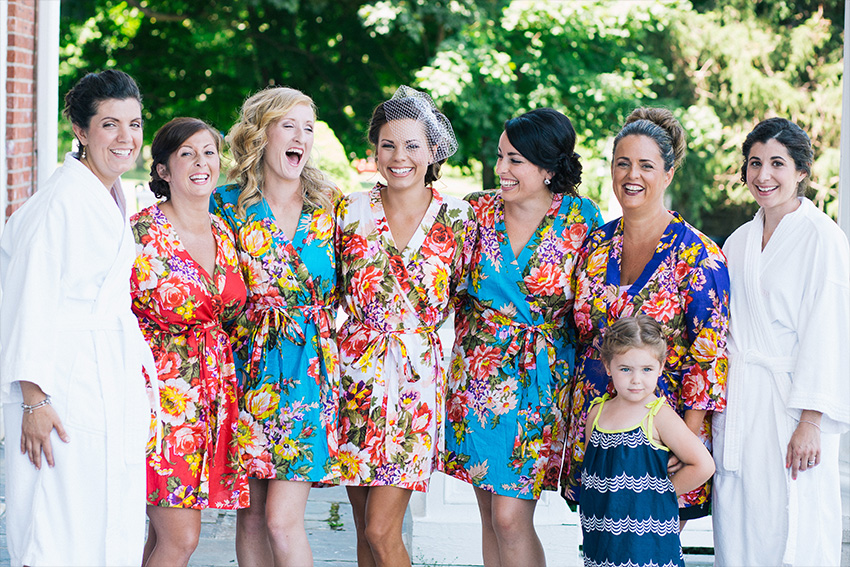 bridesmaids and bride in robes at white springs manor geneva