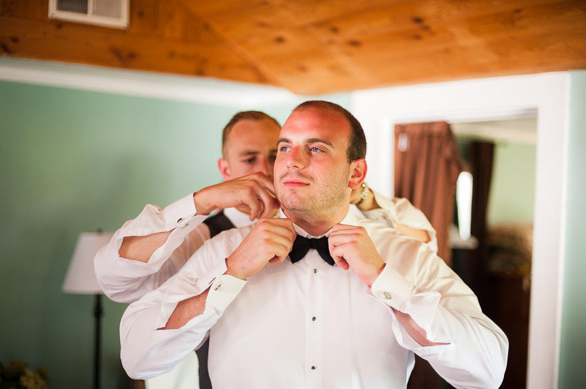 groom getting ready for wedding at John Joseph Inn