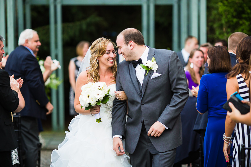 bride and groom exit wedding ceremony