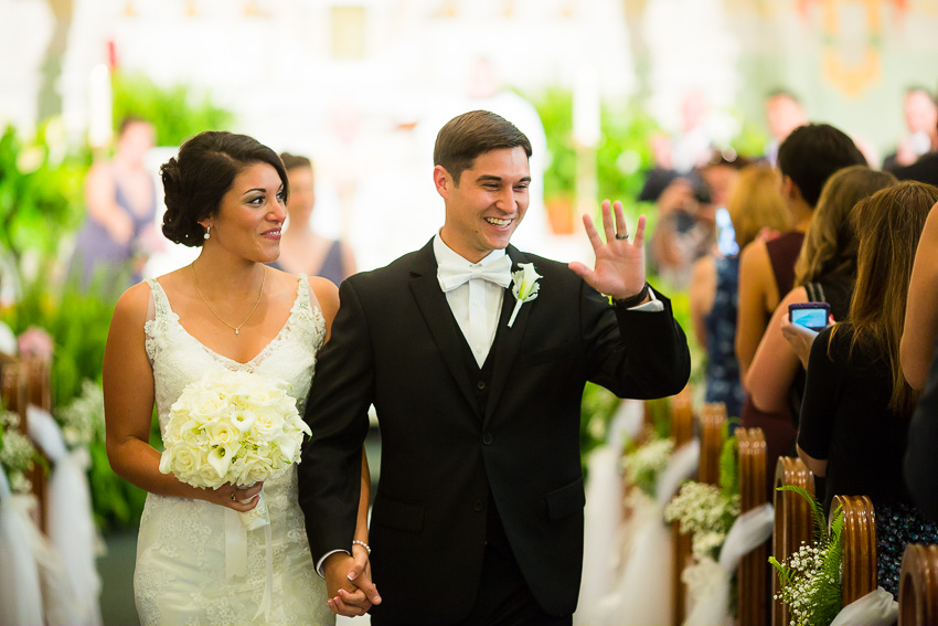 groom showing off his new ring after East Syracuse wedding ceremony