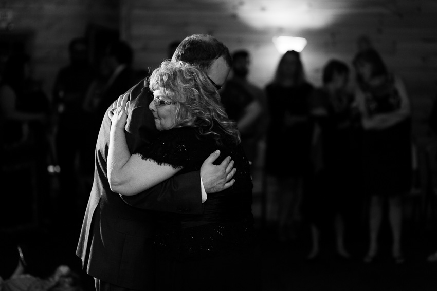 groom dances with mother at west branch wedding