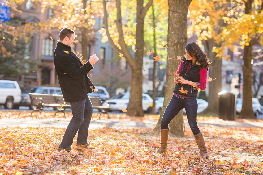 boston engagement photos playing with leaves