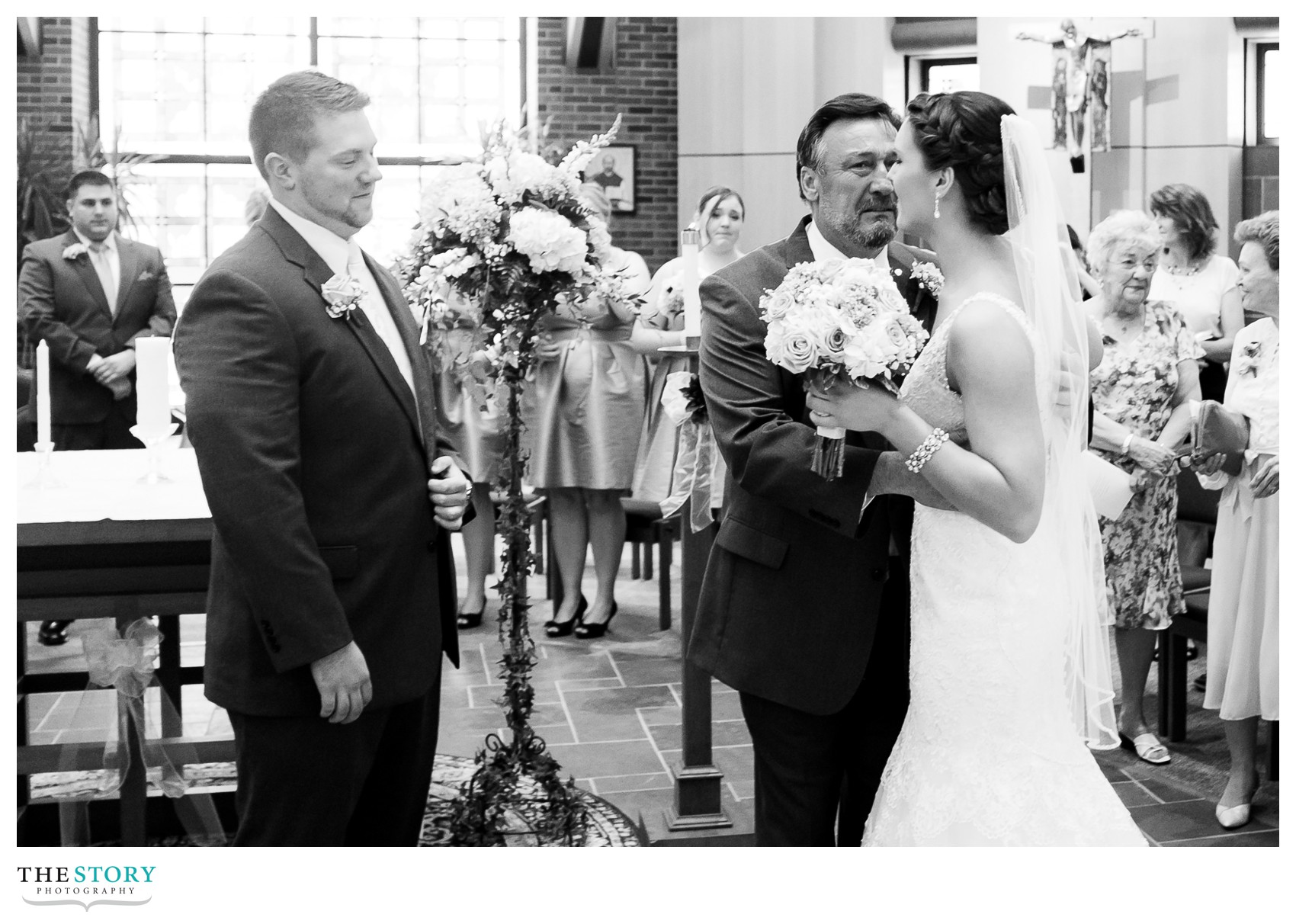 father crying at LeMoyne College wedding ceremony