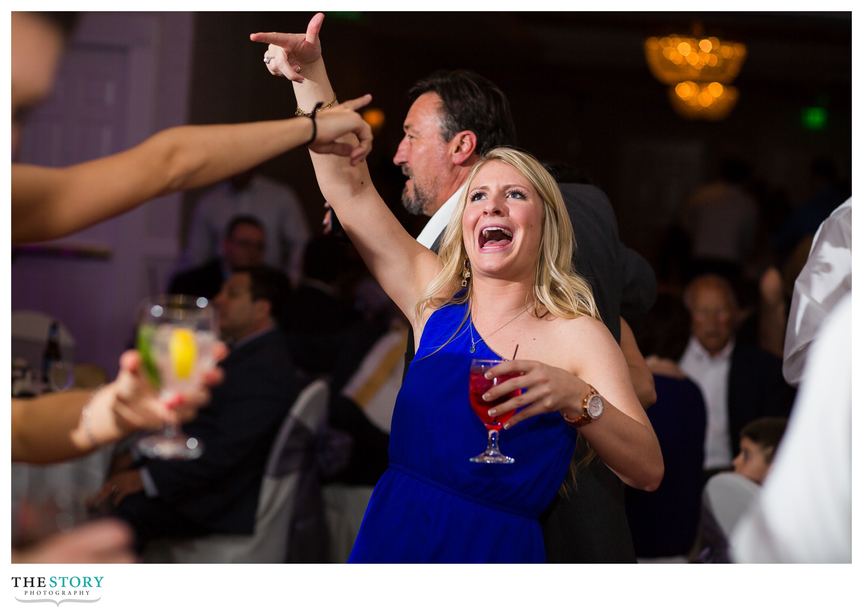 wedding guest dancing at Gensee Grande wedding reception