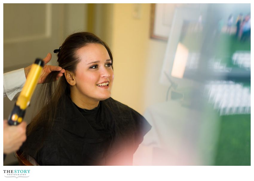 bride getting ready for Otesaga wedding ceremony