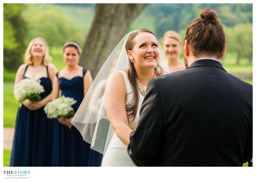 Candid moment at Otesaga outdoor wedding ceremony