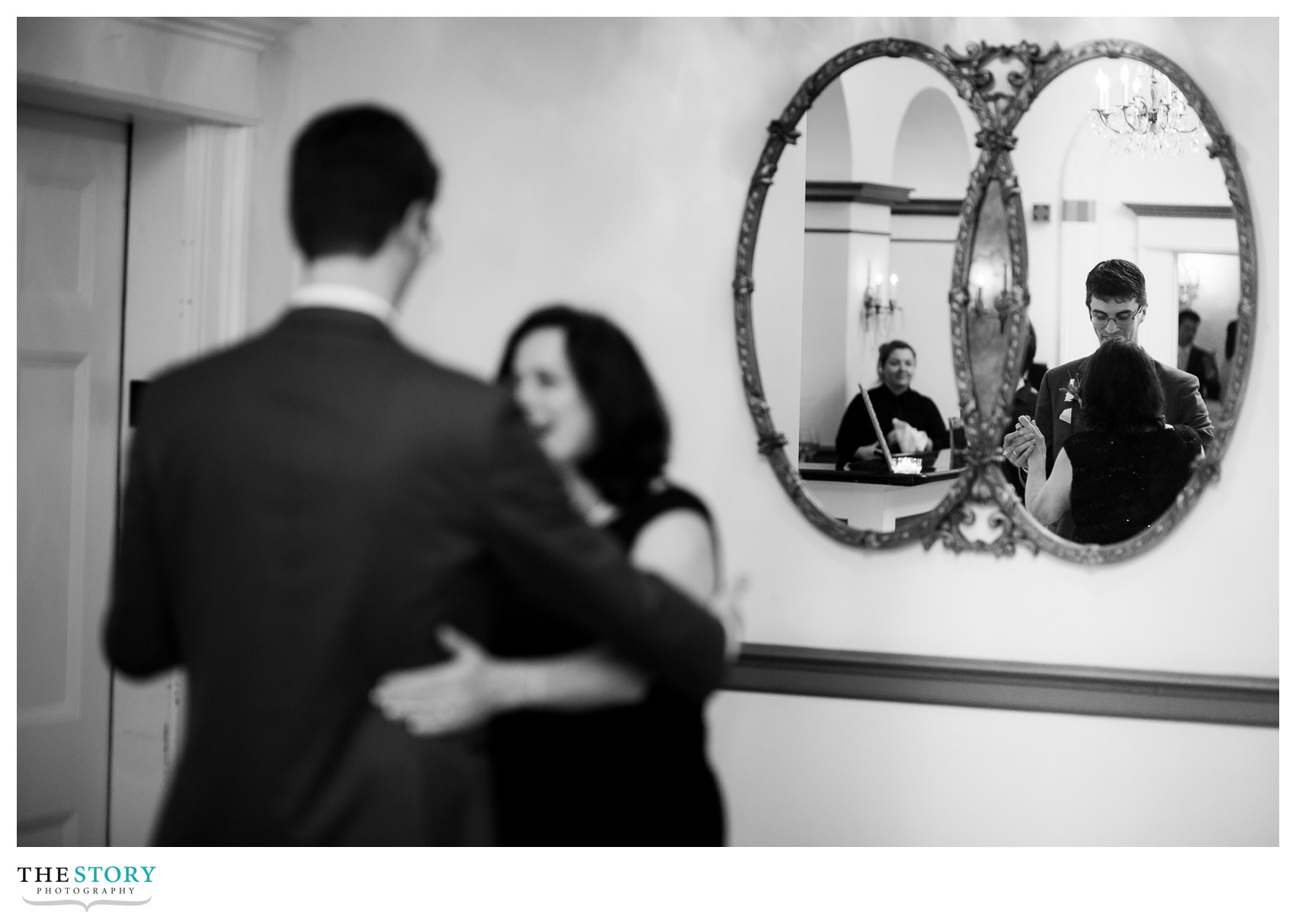 groom and mother practicing for their dance