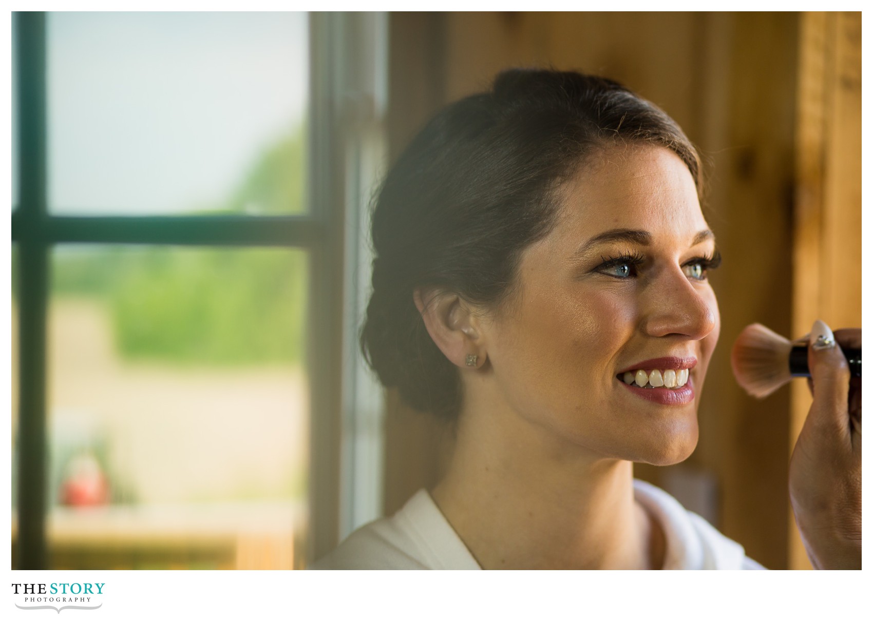 bride getting ready for wedding at Wolf Oak Acres