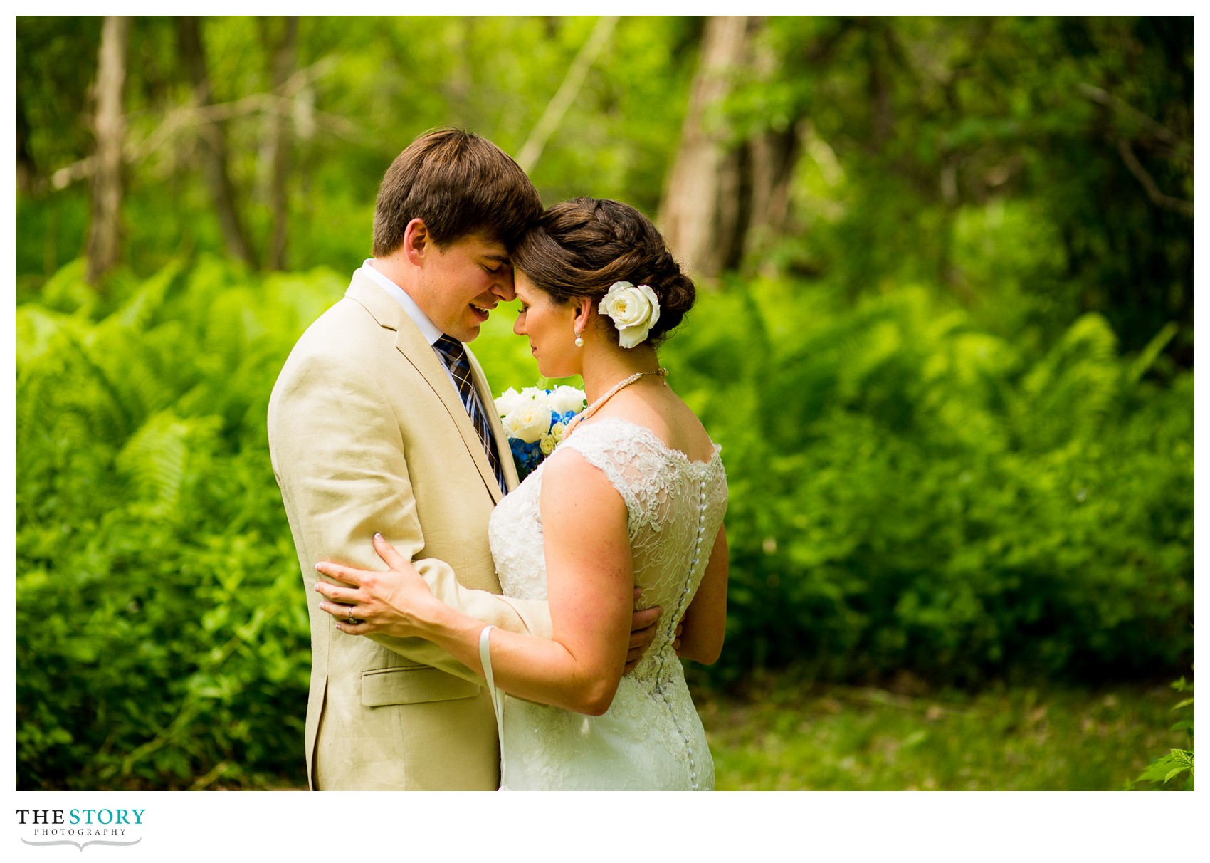 bride and groom pray before wedding at Wolf Oak Acres