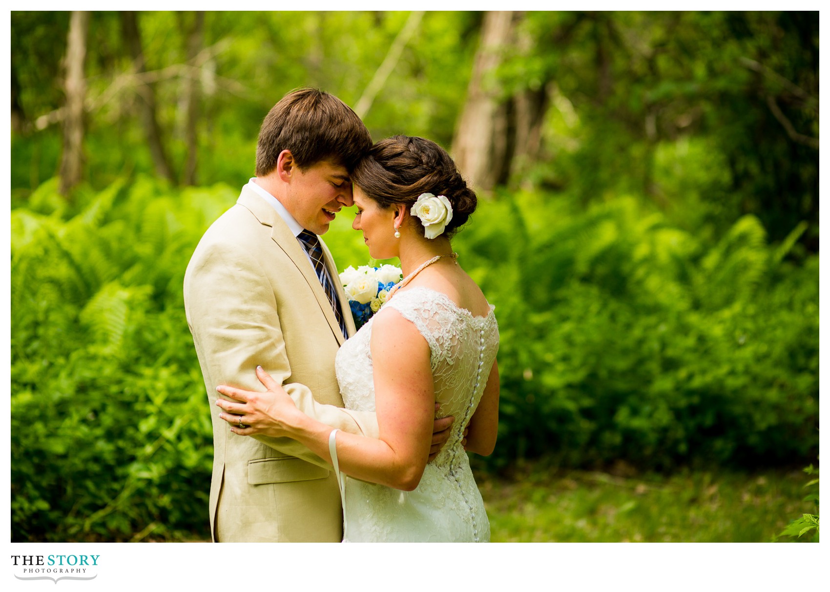 bride and groom pray before wedding at Wolf Oak Acres