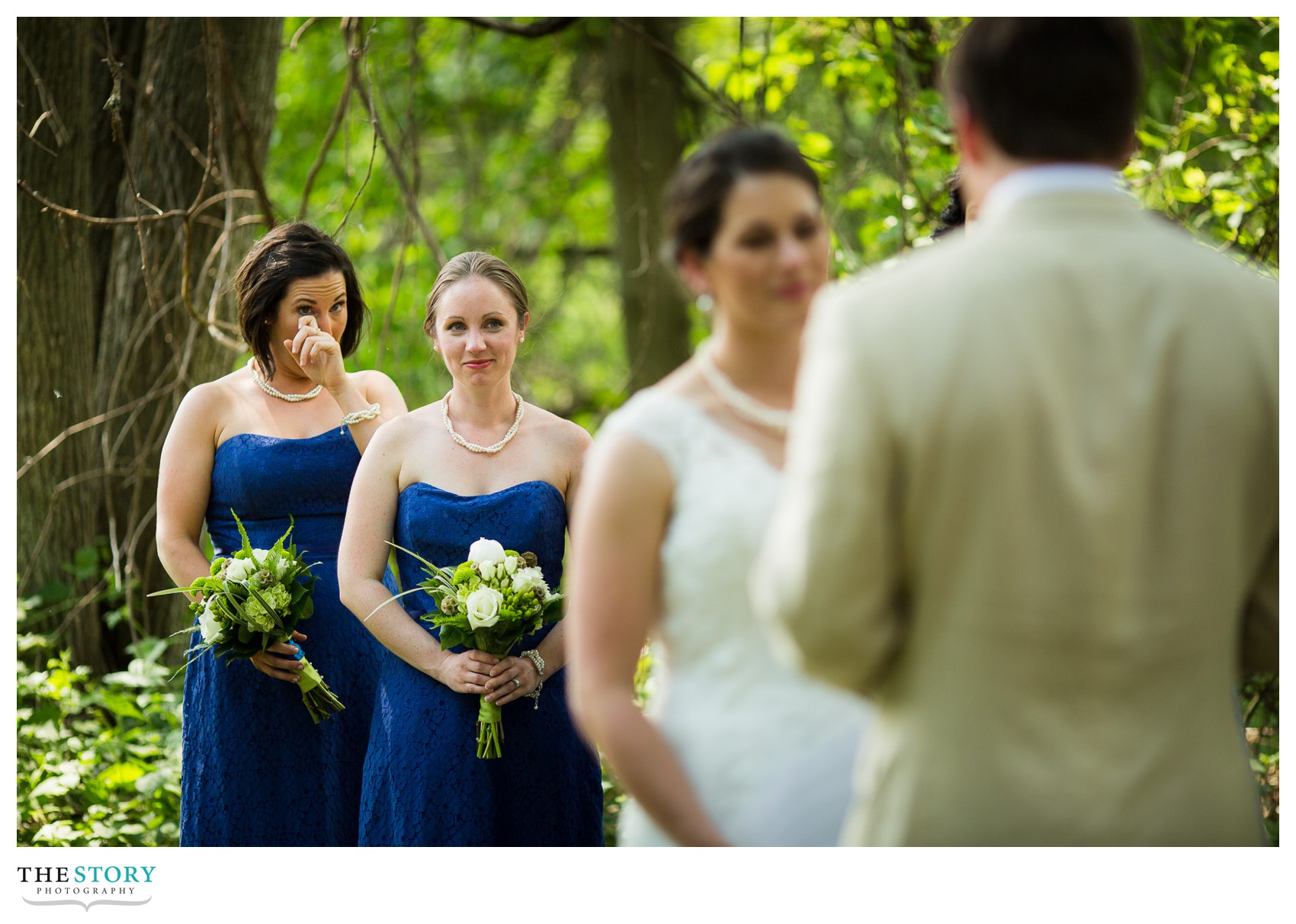 bridesmaid crying at Wolf Oak Acres wedding