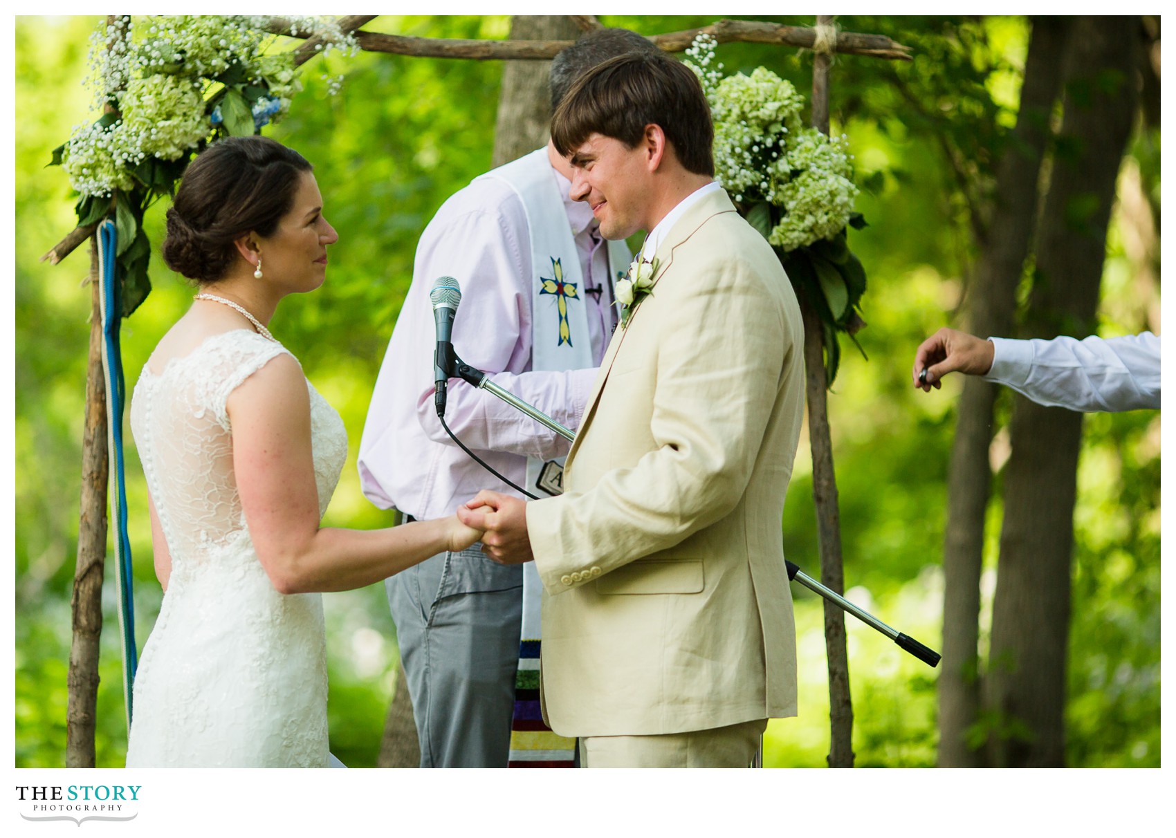 bride and groom enjoy a moment during wedding ceremony