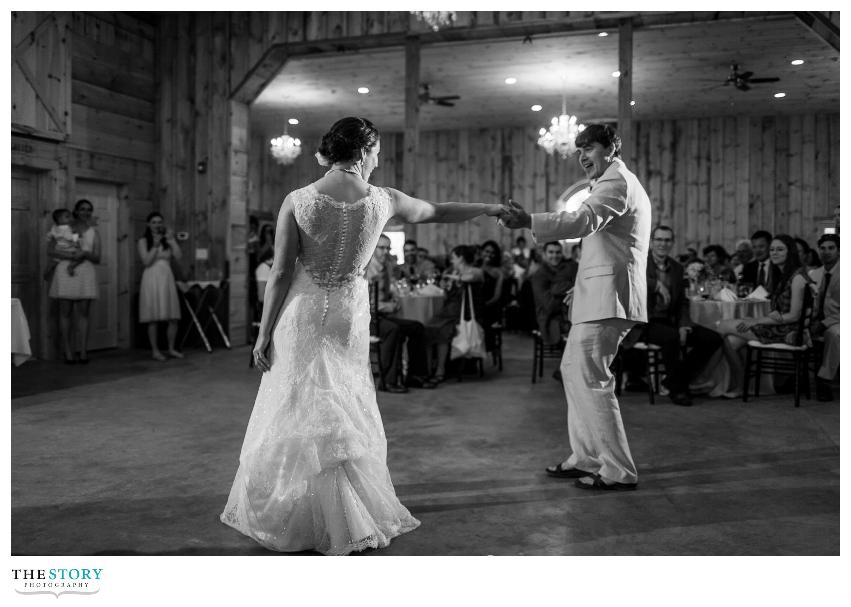 first dance at modern barn wedding reception