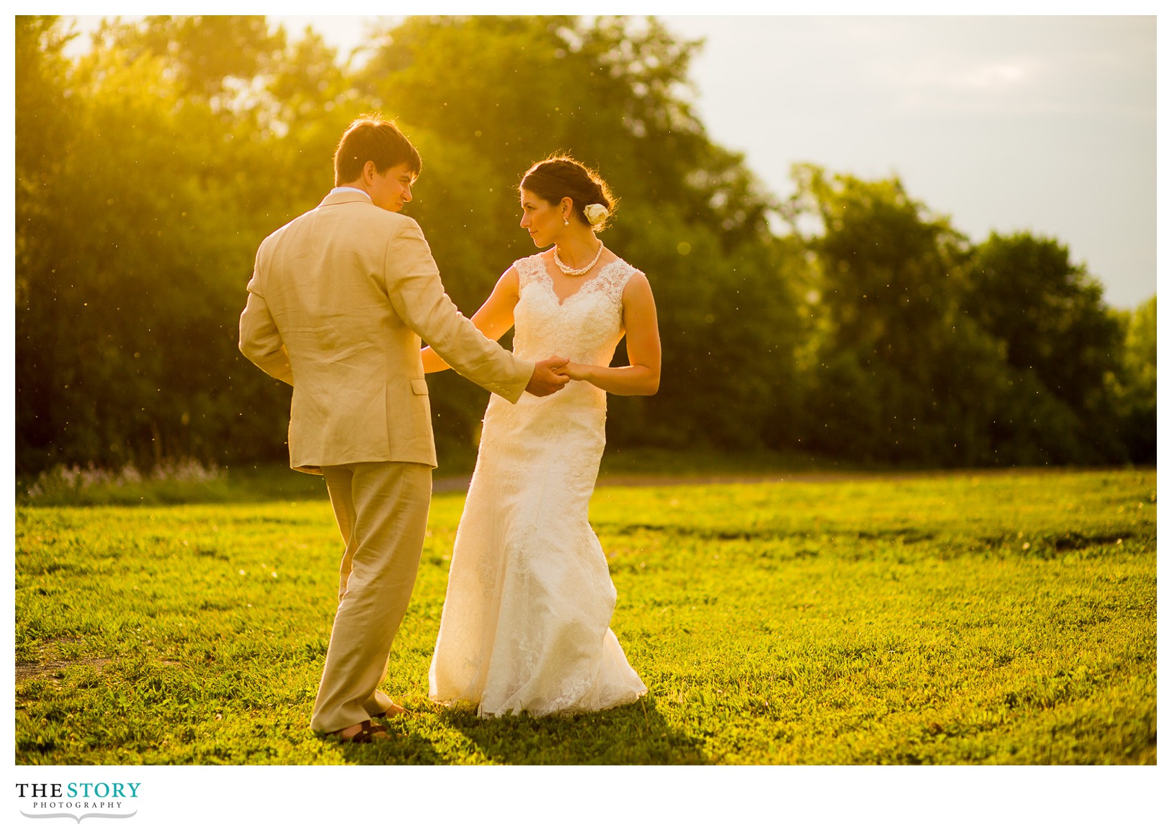 dancing in the rain at Wolf Oak Acres wedding