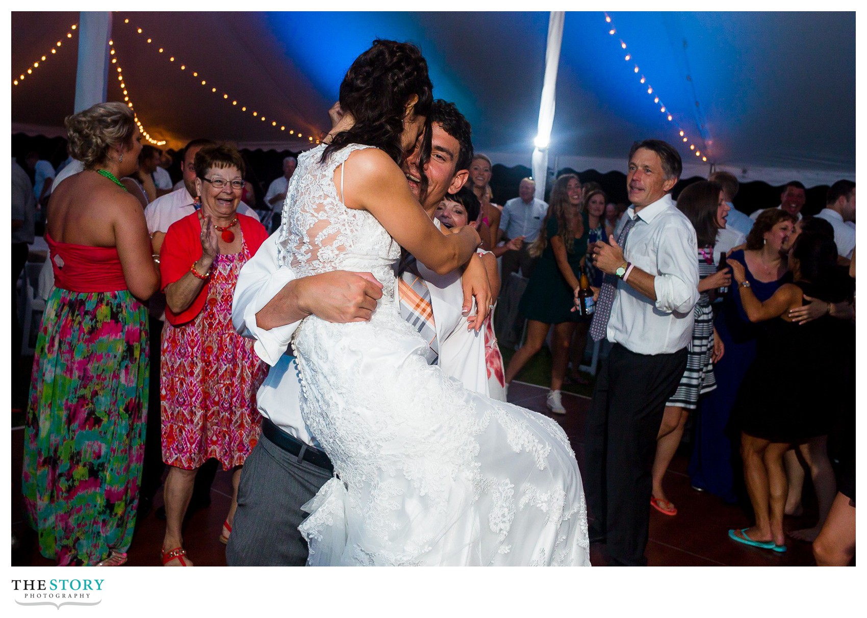 groom picks up bride at cazenovia wedding reception