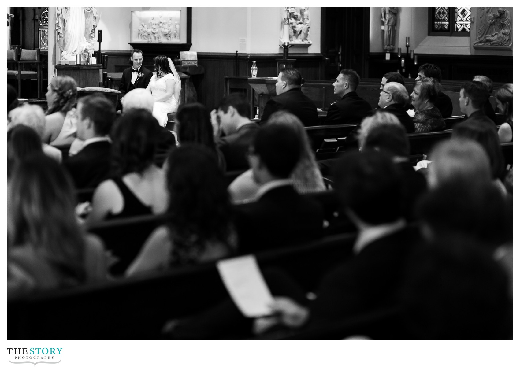 candid moment at Auburn, NY wedding ceremony