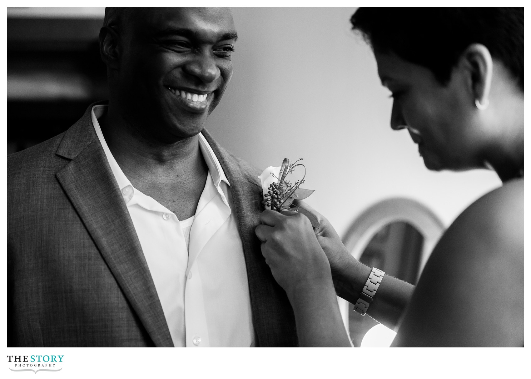 groom getting ready for mirbeau inn & spa wedding