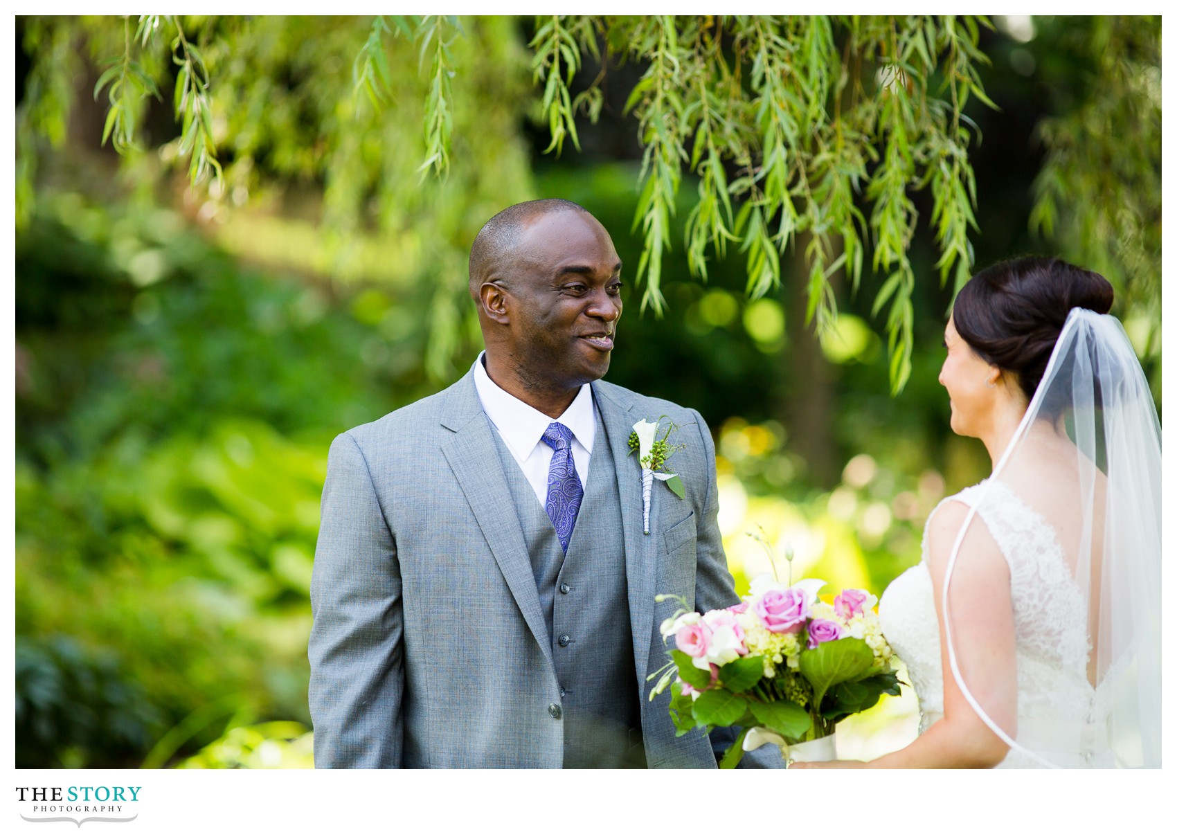 groom sees bride for the first time on wedding day at mirbeau