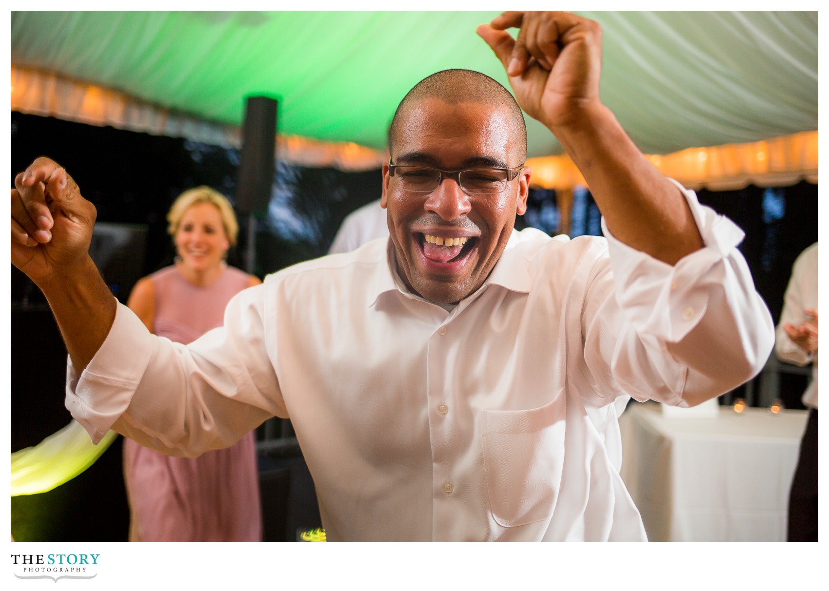 wedding guests dancing at mirbeau reception