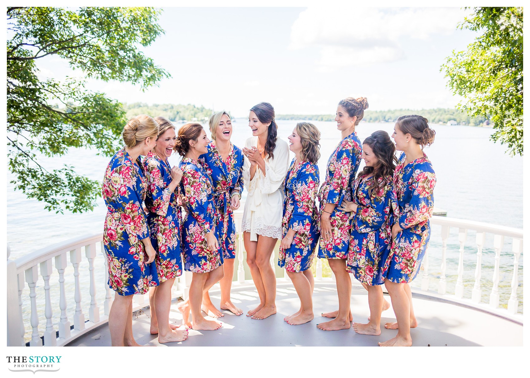 bridesmaids on porch overlooking St. Lawrence River before wedding