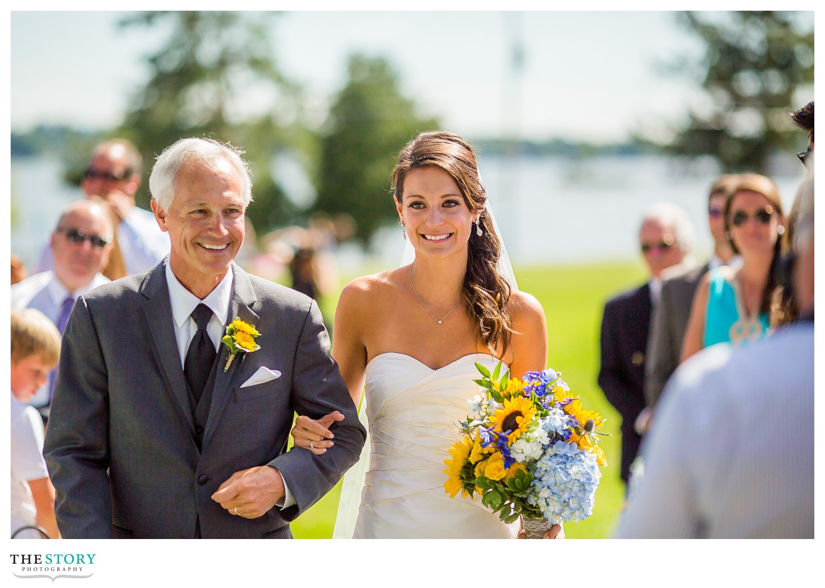 bride and father walk down aisle for T.I. Park wedding ceremony