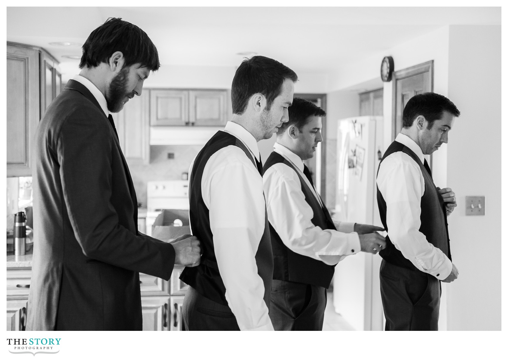 groom and groomsmen getting ready on wedding day