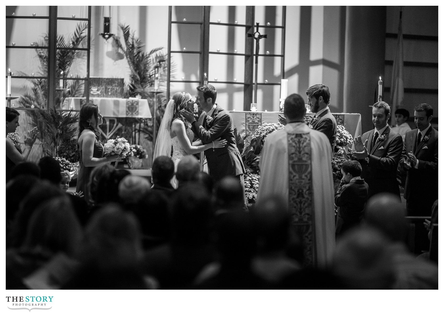 bride and groom's first kiss on as husband and wife