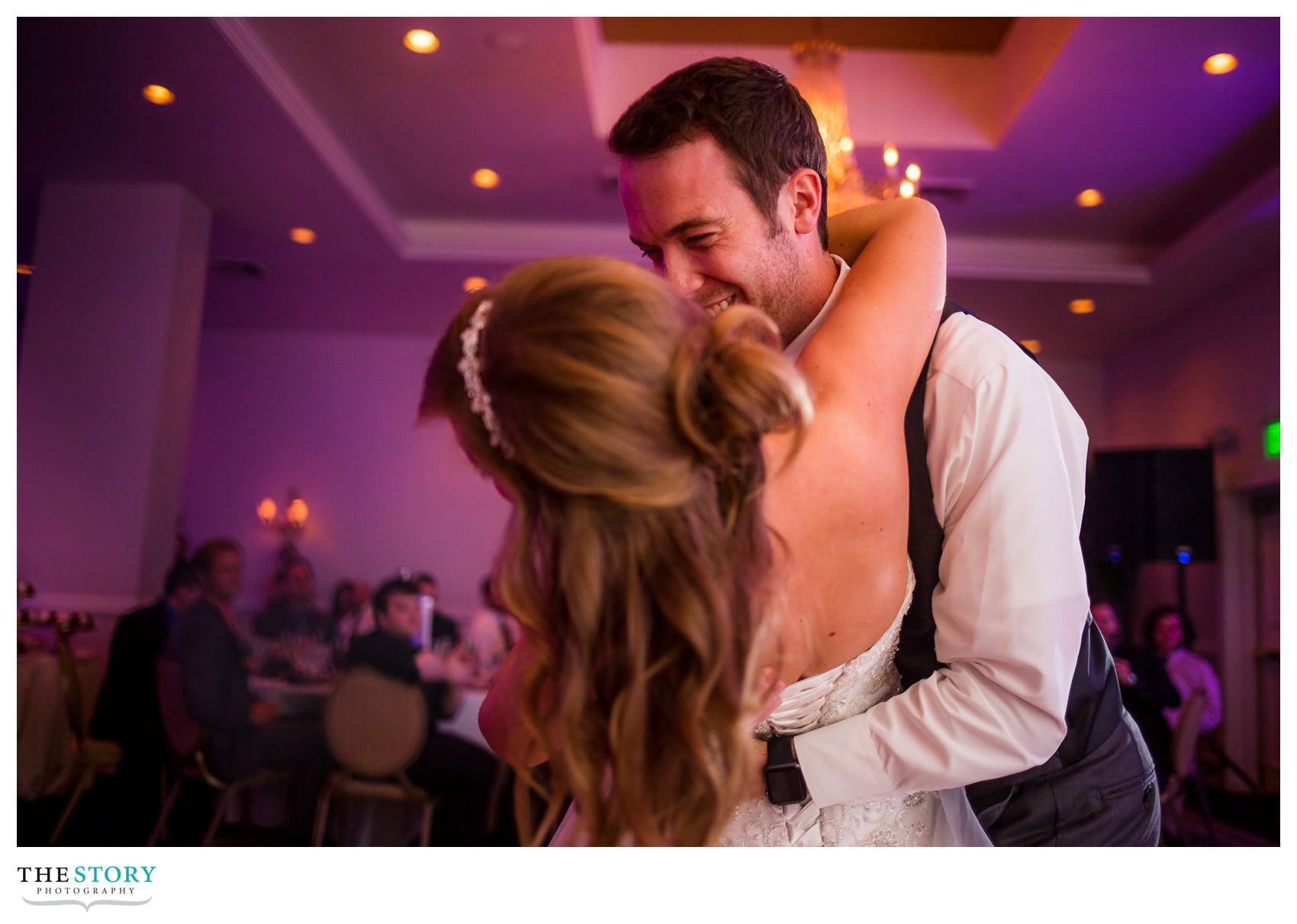 fun moment during first dance at Genesee Grande Hotel wedding