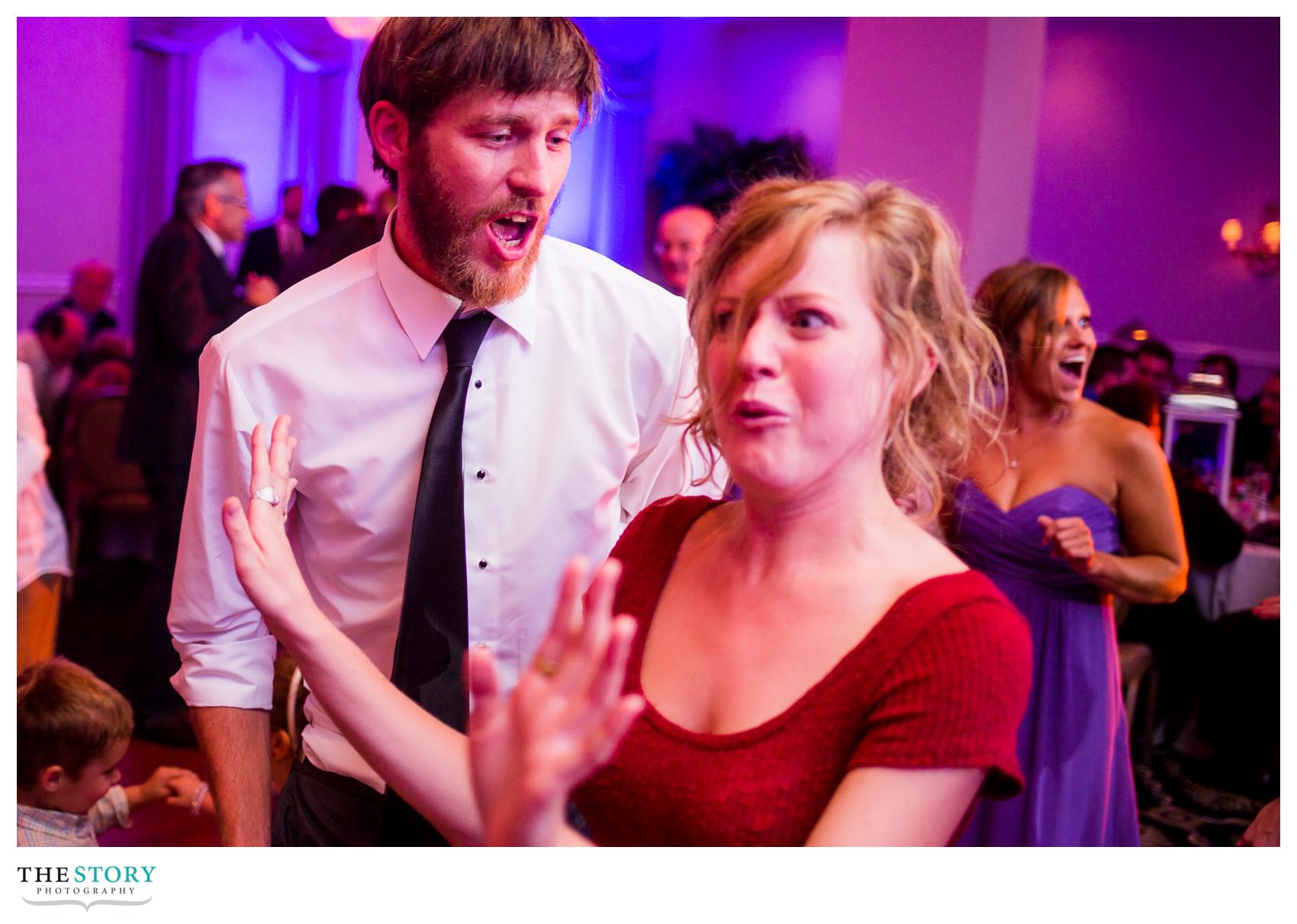 wedding guests having fun at Genesee Grande Hotel