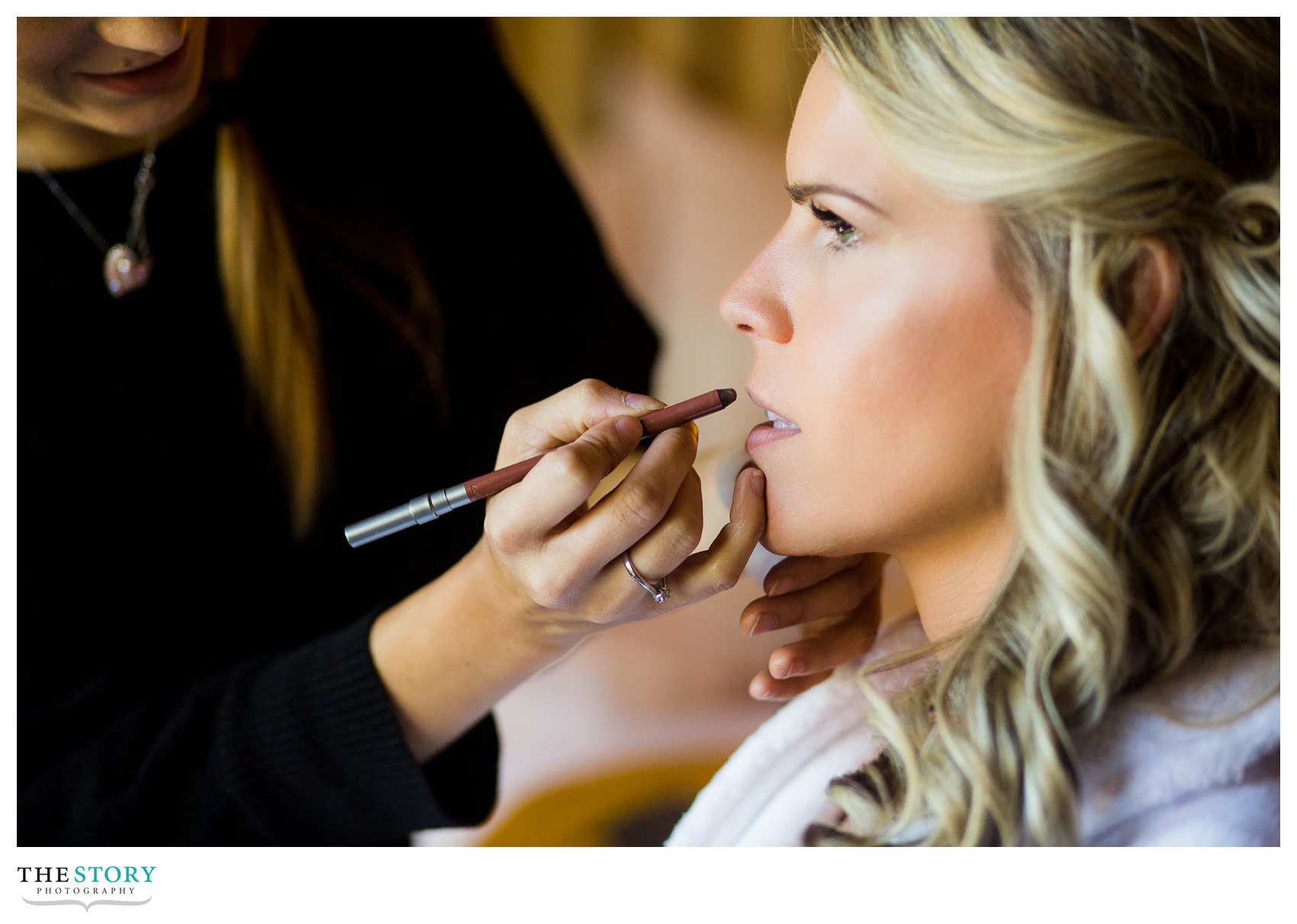 bride getting ready for intimate mirbeau spa wedding