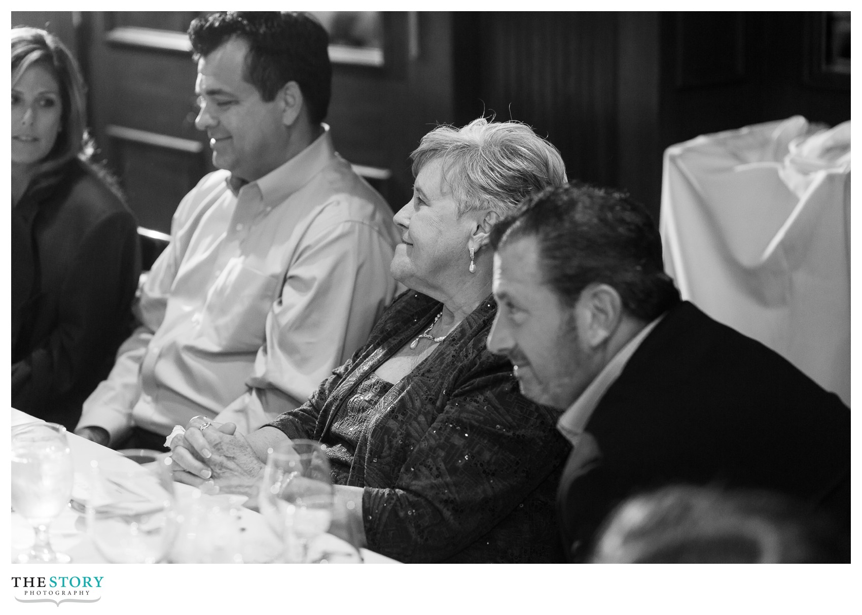 bride's mother listening to speech at Sherwood Inn wedding dinner