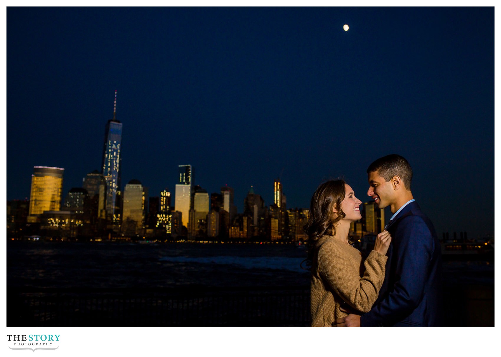 Lower Manhattan skyline engagement photo