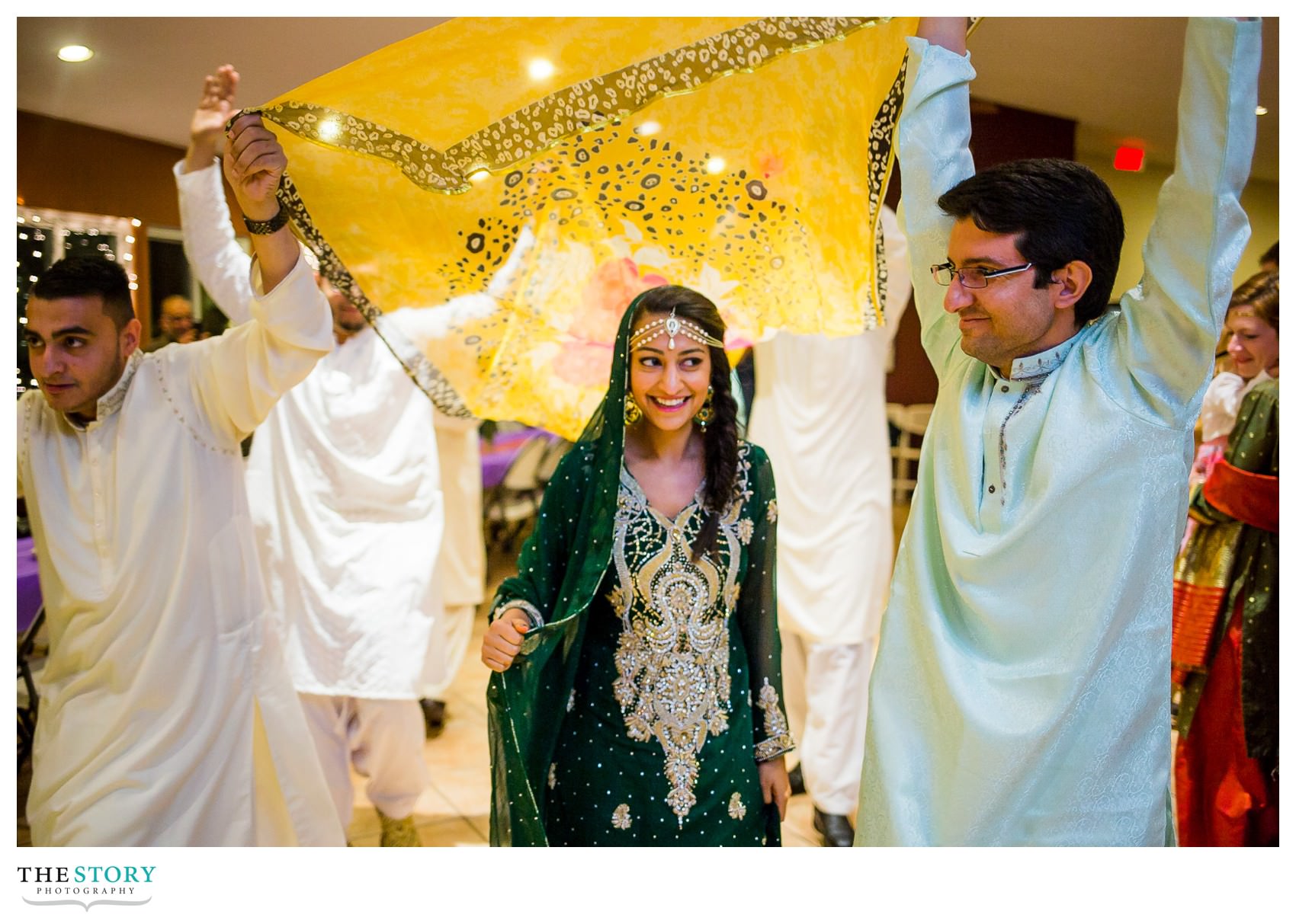 bride's entrance to henna celebration in Rochester