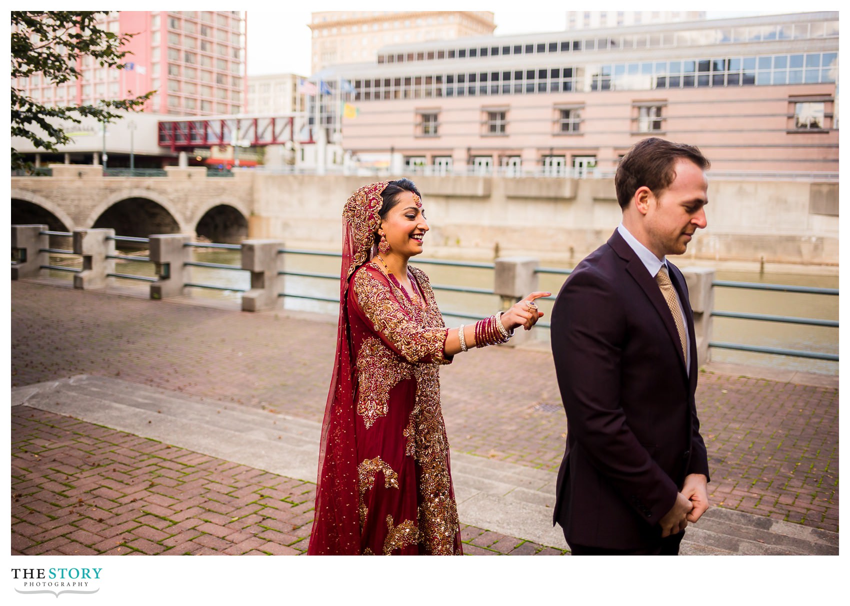 bride and groom's first look at Rochester Aqueduct Park