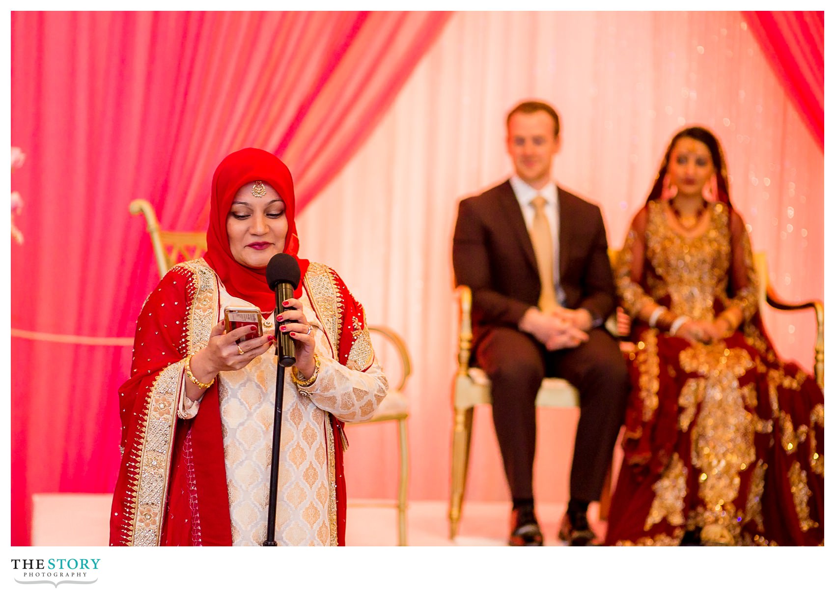 bride's sister welcomes guests before Rochester Nikah