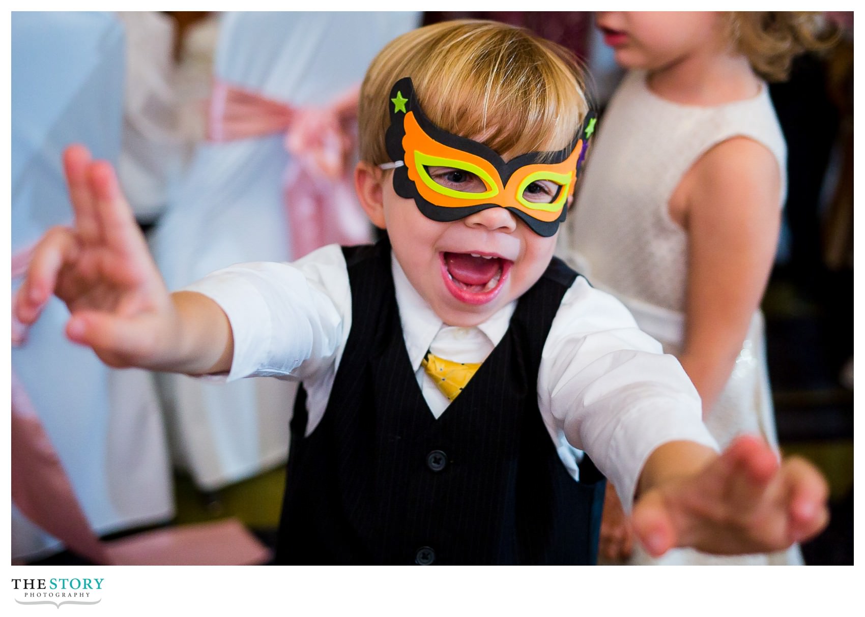 little boy having fun at Rochester Radisson wedding reception