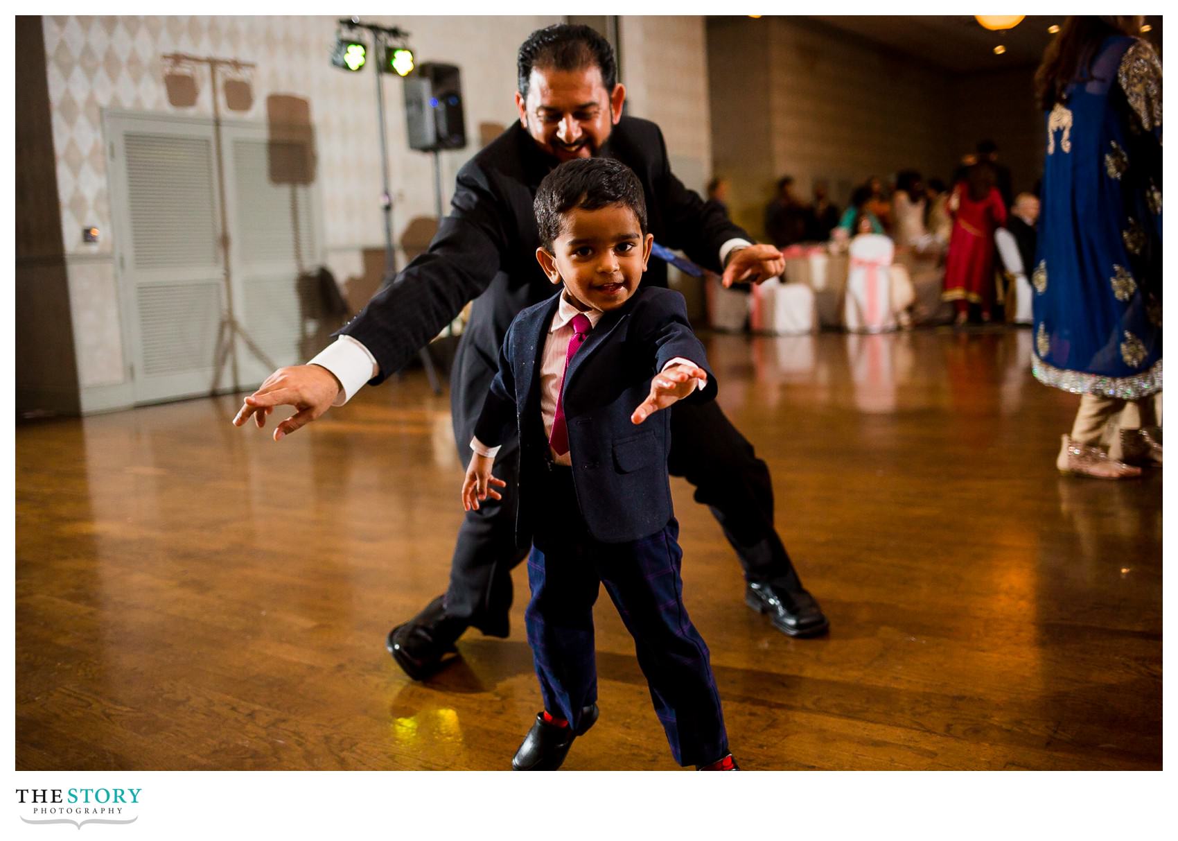 little boy dancing at Rochester wedding reception