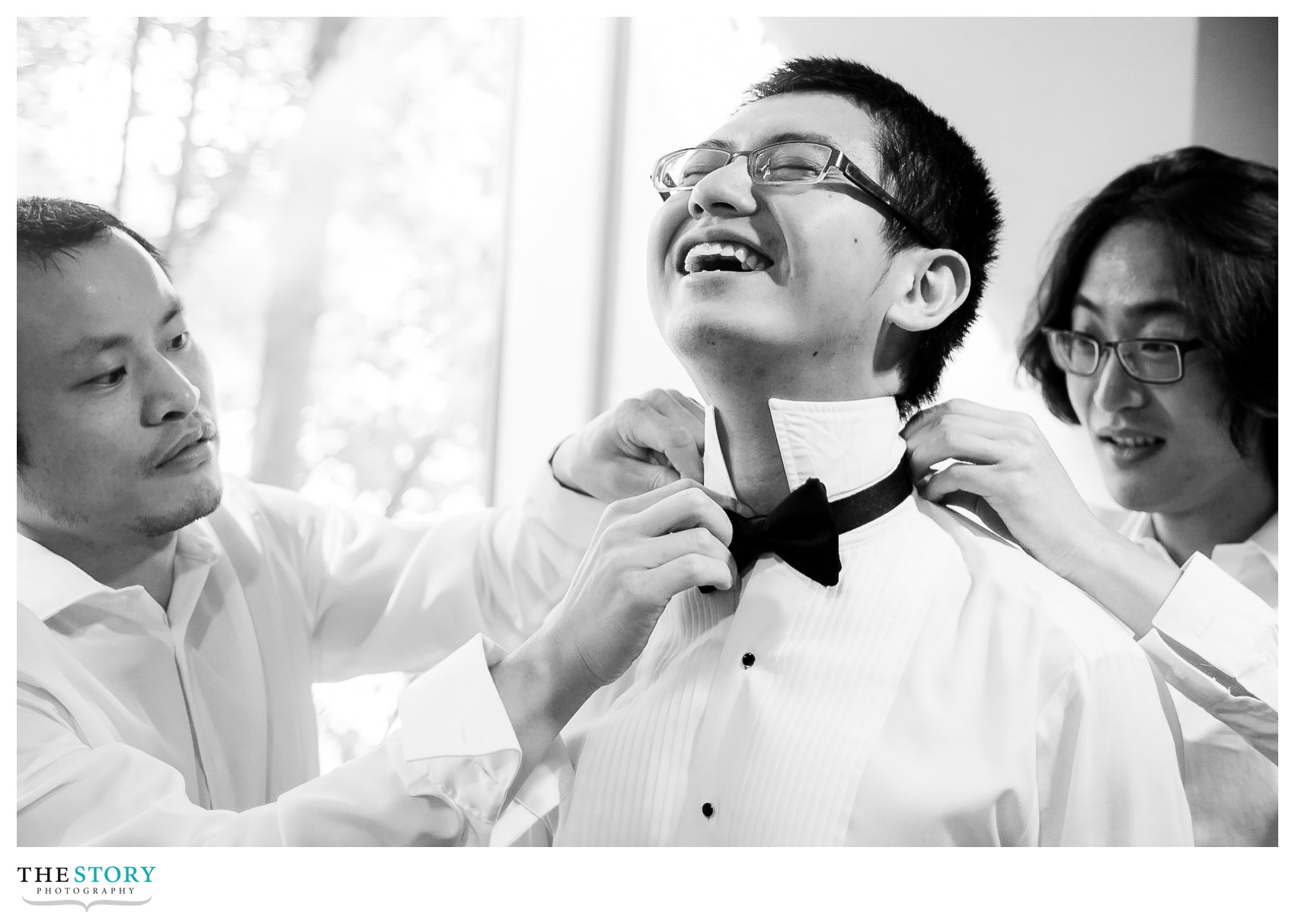 groom getting ready at Statler Hotel for Cornell wedding