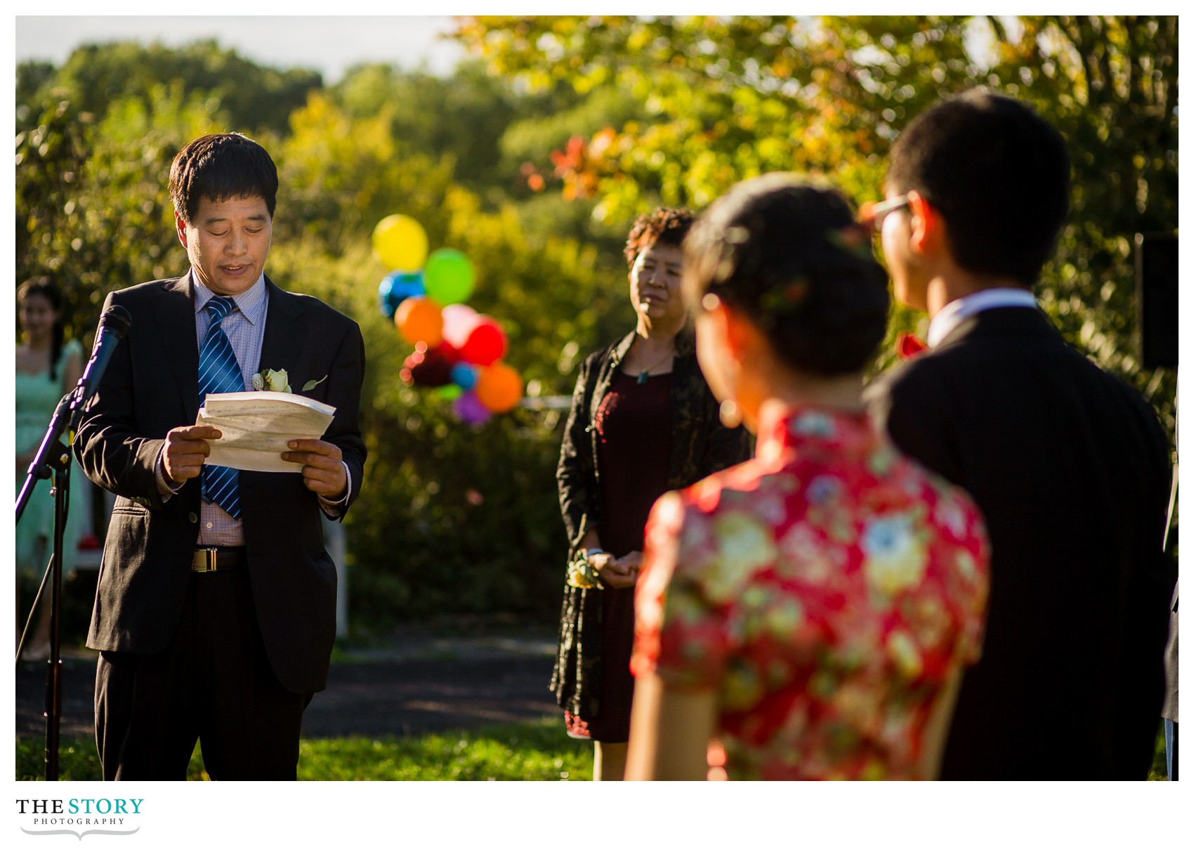 bride's father gives speech during wedding at Cornell Plantations