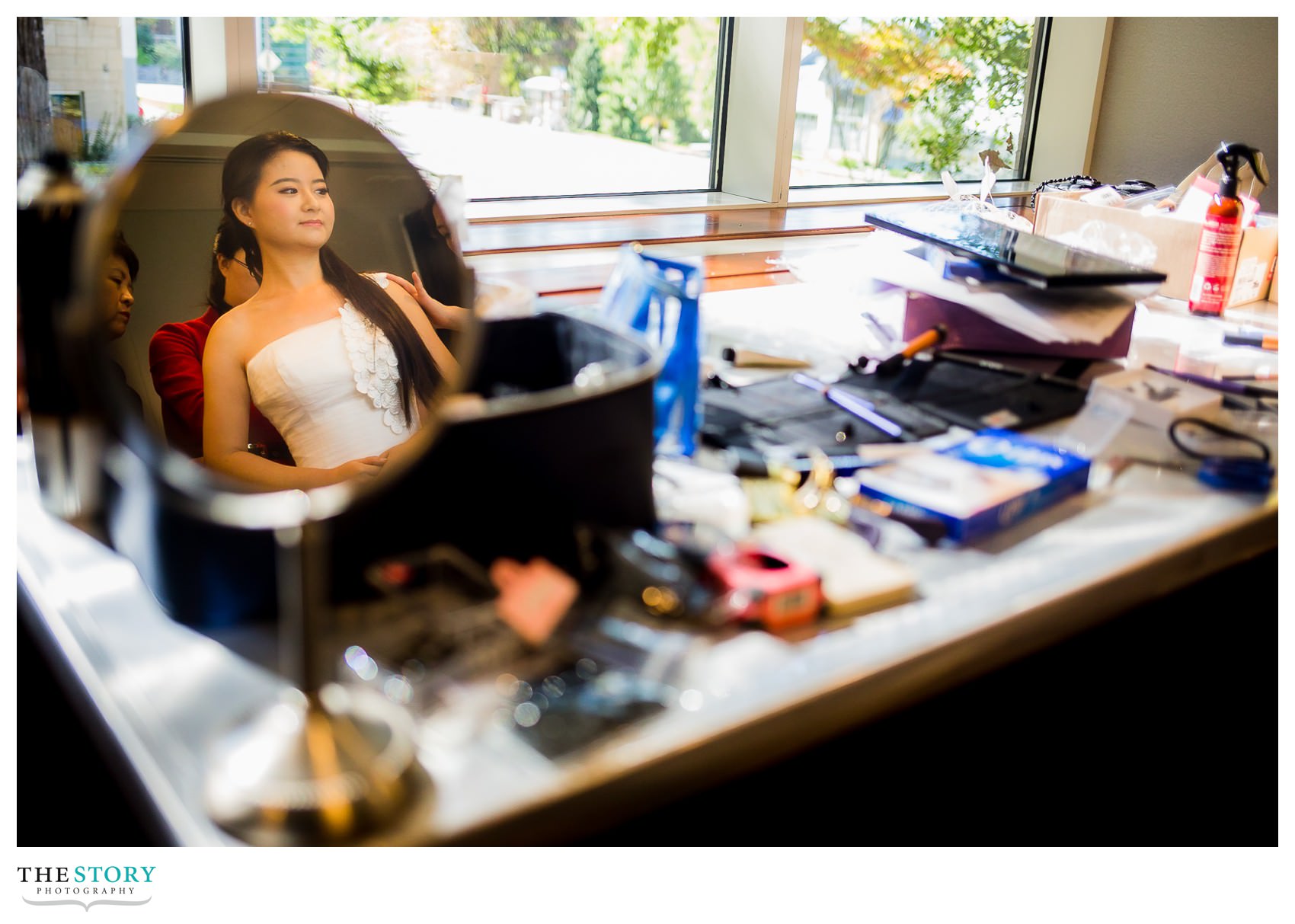 bride getting ready for wedding at Statler Hotel