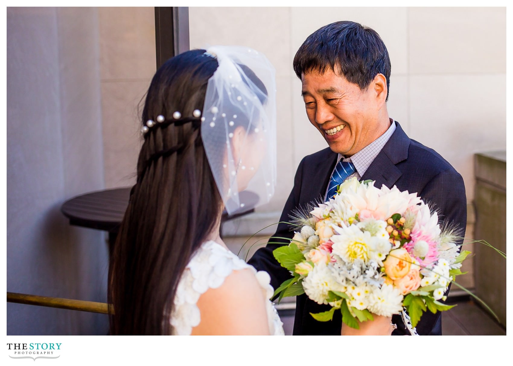 father seeing bride for the first time on the wedding day at Cornell