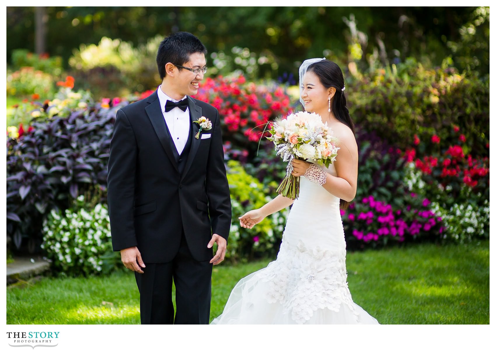 bride and groom's first look at Cornell University wedding