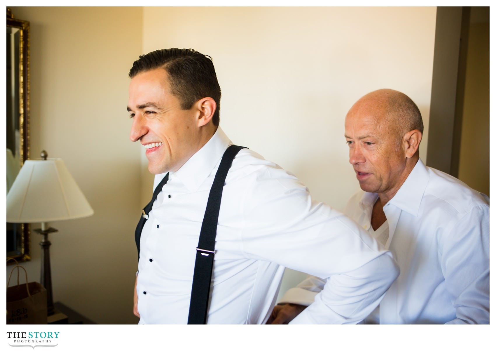 groom getting ready for wedding day at Genesee Grande Hotel