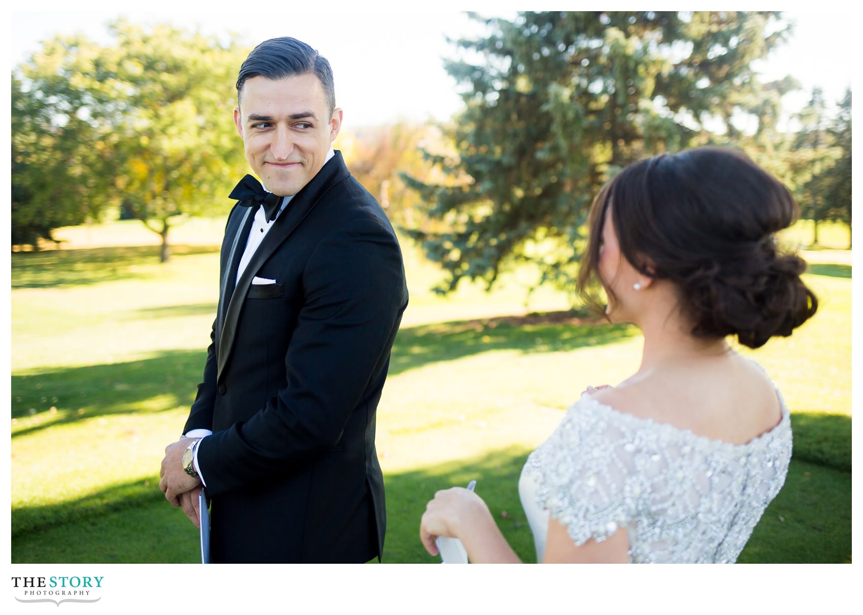 groom sees bride for the first time on wedding day at Onondaga Country Club
