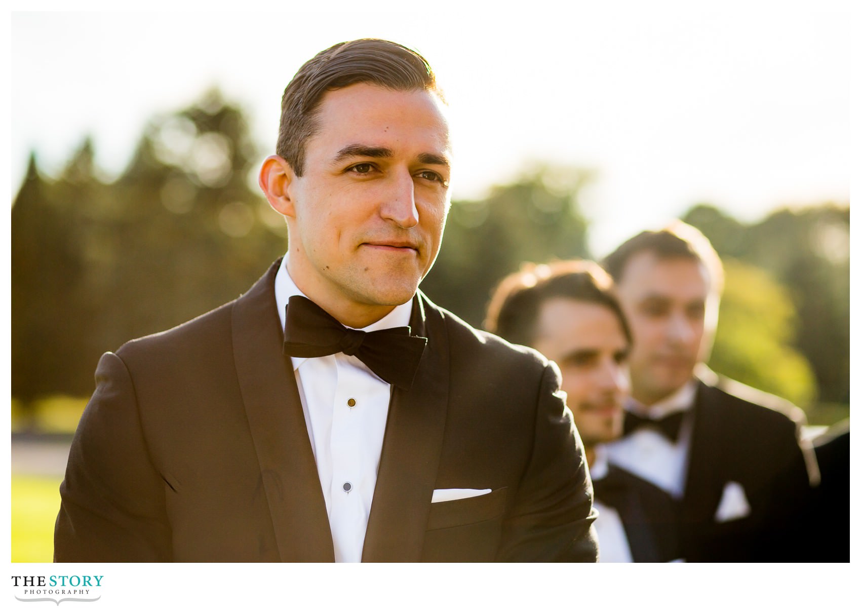 groom watching bride walk down the aisle at Onondaga Country Club wedding